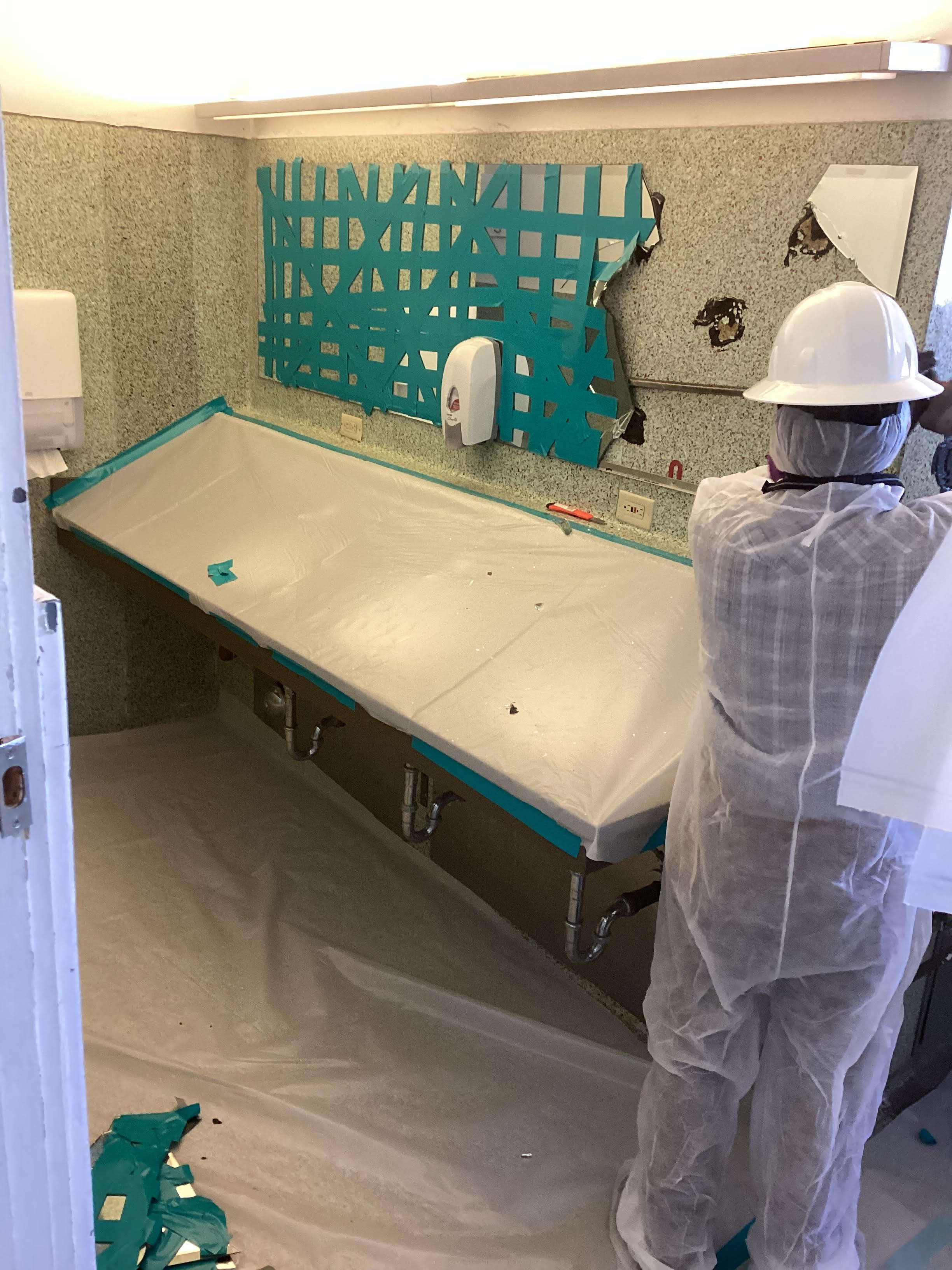 Bathroom containment and surface protection at ASU Irish Hall in Tempe, Arizona