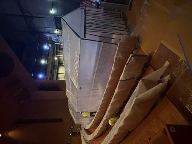 Temporary containment enclosure and protected auditorium aisles