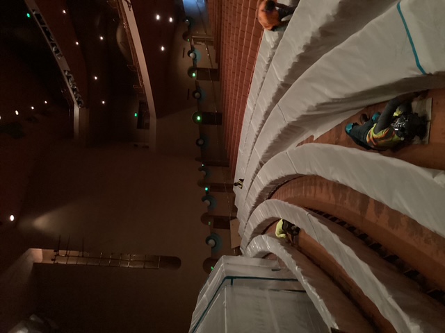 Containment and protected seating across the auditorium