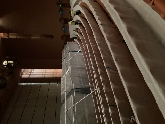Long rows of protected auditorium seating during project work
