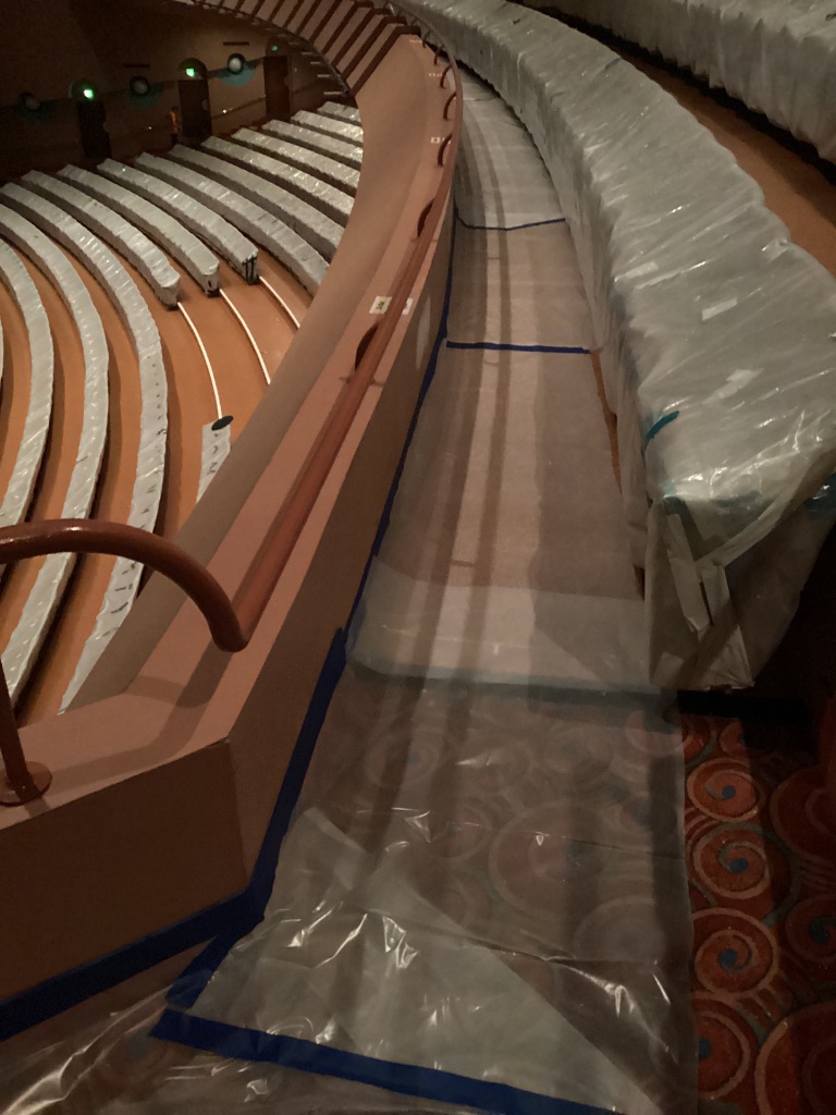 Protected walkway beside auditorium seating