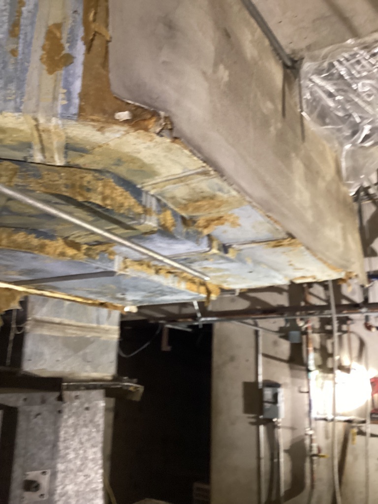Deteriorated duct and insulation conditions at Luke Air Force Base B904
