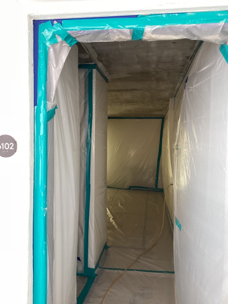 Temporary containment at a Monarch Hotel room doorway