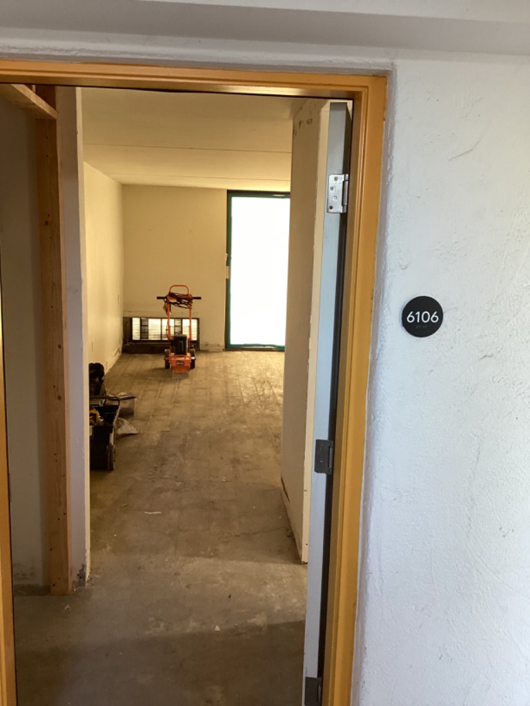Hotel room work area prepared for controlled construction work