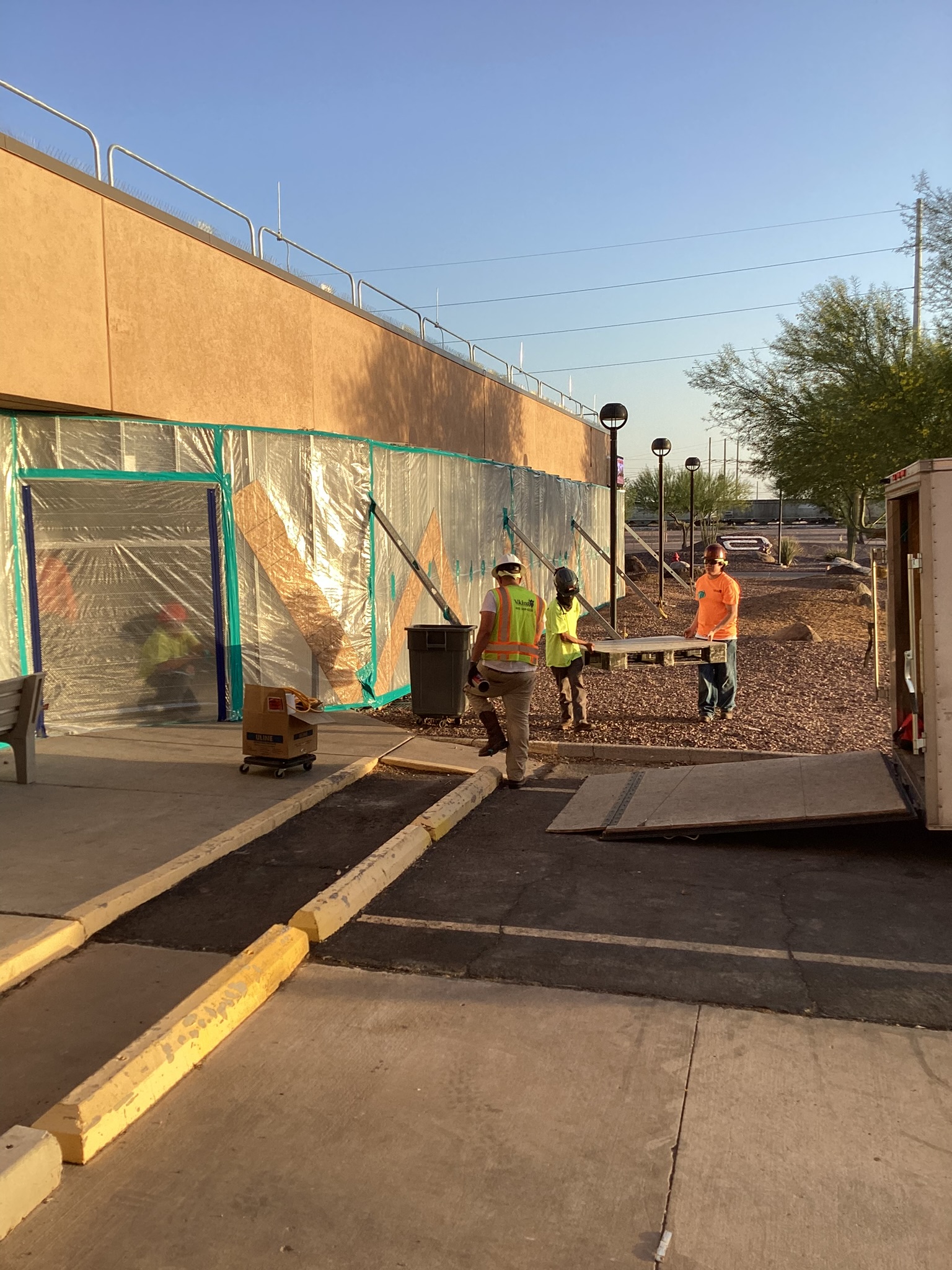 Exterior containment and crew staging at a commercial facility