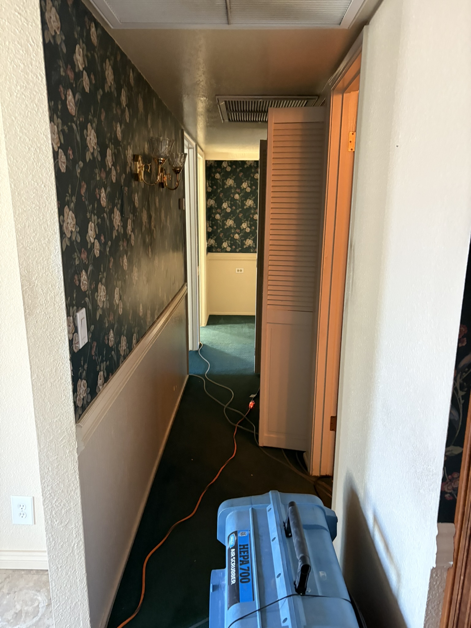 HEPA cleaning equipment in a protected interior work area