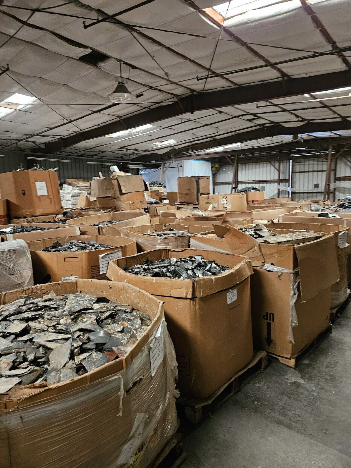CRT glass and contaminated debris before removal.