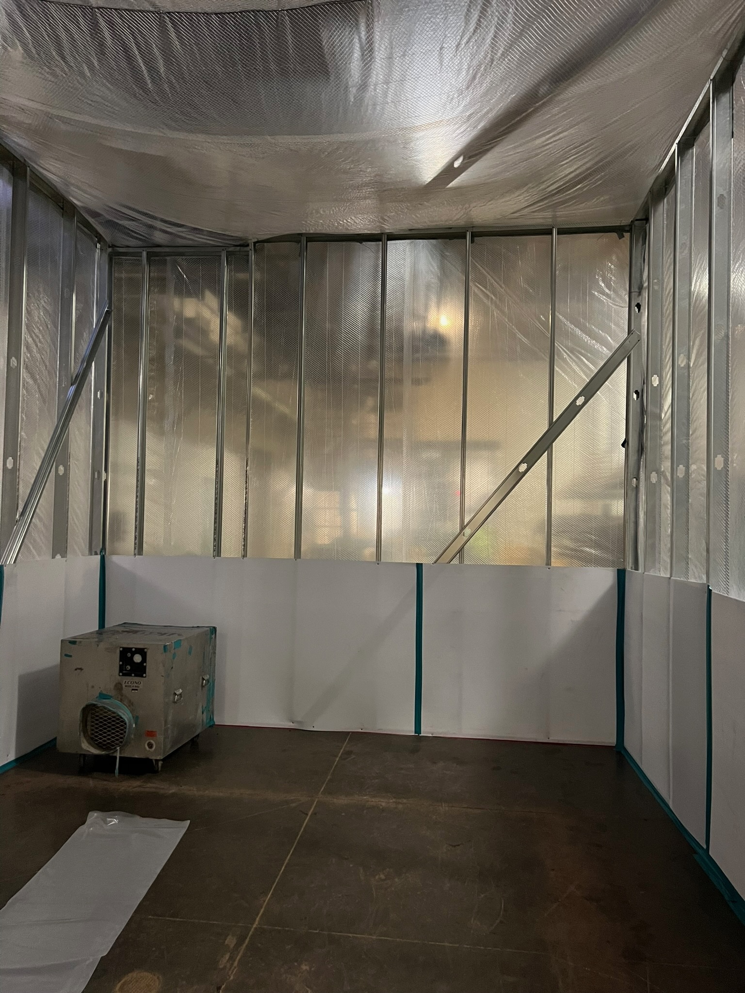 Framed negative-air containment enclosure for regulated construction work